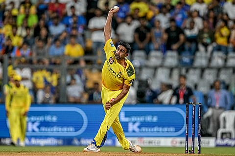 Chennai Super Kings' Ravichandran Ashwin bowls during the Indian Premier League (IPL) Twenty20 cricket match between Mumbai Indians and Chennai Super Kings at the Wankhede Stadium in Mumbai on April 20, 2025.