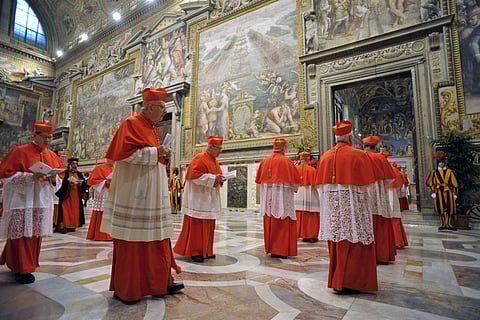 This handout picture released by the Vatican press office shows cardinals entering in the Sistine Chapel before the start of the conclave at the Vatican on March 12, 2013.