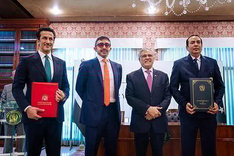Sheikh Abdullah bin Zayed Al Nahyan (2nd from L) and Muhammad Ishaq Dar (3rd from during the MoUs signing ceremony Islamabad