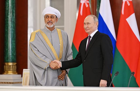 Russia's President Vladimir Putin and Sultan of Oman Haitham bin Tariq attend a signing ceremony following their talks at the Kremlin in Moscow on April 22, 2025.