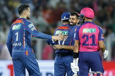 Rajasthan Royals' Dhruv Jurel wears a dejected look as Lucknow Super Giants players celebrate their win in the IPL Season 18 match in Jaipur on Saturday.