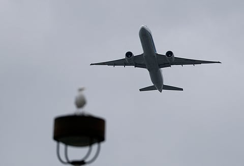 Fellow passengers and crew members had restrained the man while the plane was in the air.