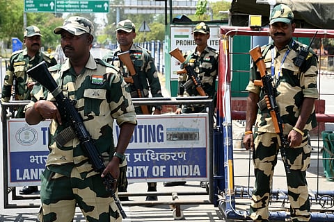 Indian Border Security Force (BSF) soldiers stand guard at the India-Pakistan Wagah border post on the outskirts of Amritsar on April 24, 2025.