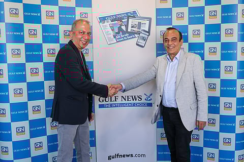 Vijay Vaghela (right), Interim CEO, Gulf News, and Shekhar Iyer, Director and General Manager at BMEG ME FZ LLC, after signing the partnership deal between Gulf News and Magzter.