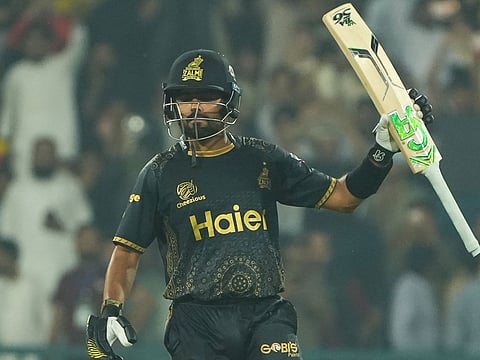Peshawar Zalmi rode on Babar Azam and Hussain Talat half-centuries to score a seven-wicket in against Lahore Qalandars in the PSL on Thursday.
