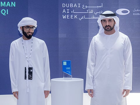 Sheikh Hamdan bin Mohammed bin Rashid Al Maktoum, Crown Prince of Dubai, Deputy Prime Minister, Minister of Defence, and Chairman of the Board of Trustees of the Dubai Future Foundation, honours Abdulrahman Al Marzooqi during Dubai AI Week.