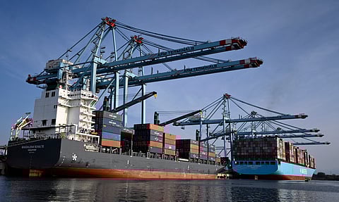 Singapore flagged Magdalena Schulte and Danish flagged Maersk Edinburg cargo ships are pictured at the Lazaro Cardenas Cargo Port, Michoacan State, Mexico on April 25, 2025.