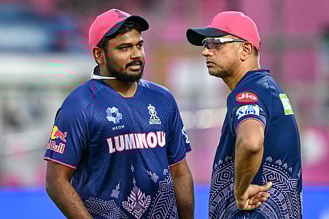 Rajasthan Royals captain Sanju Samson (left) speaks with head coach Rahul Dravid before the IPL match against the Gujarat Titans in Jaipur on April 28, 2025.