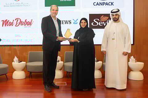 Marclino Fernandes, COO Gulf News receiving award from Dr Naseem Mohammed Rafea, Acting CEO of the Environment, Health, and Safety Agency at Dubai Municipality. The award is given in recognition of outstanding efforts of Gulf News in promoting health and safety standards in the organisation.