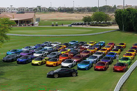 Participants assembled at the Arabian Ranches Golf Club in Dubai, where various McLaren models were showcased, including the 12C, 675LT, 765LT, 750S, Artura, and the P1.