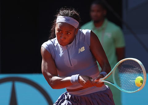 USA's Coco Gauff returns the ball to Poland's Iga Swiatek during their 2025 WTA Tour Madrid Open tennis tournament semi-final singles match at the Caja Magica in Madrid, on May 1.
