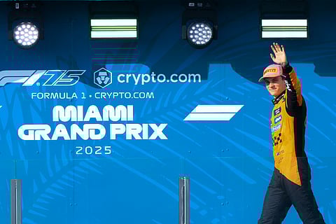 McLaren's Australian driver Oscar Piastri arrives on the podium after winning the 2025 Miami Formula One Grand Prix at Miami International Autodrome in Miami Gardens, Florida, on May 4.