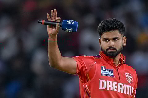 Punjab Kings' captain Shreyas Iyer gestures during the toss before the start of the Indian Premier League (IPL) Twenty20 cricket match against Lucknow Super Giants at the Himachal Pradesh Cricket Association Stadium in Dharamsala on May 4, 2025.