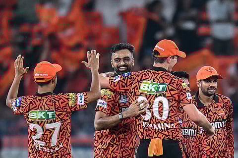 Sunrisers Hyderabad's Jaydev Unadkat (2L) celebrates with teammates after taking the wicket of Delhi Capitals' KL Rahul during the Indian Premier League (IPL) Twenty20 cricket match.