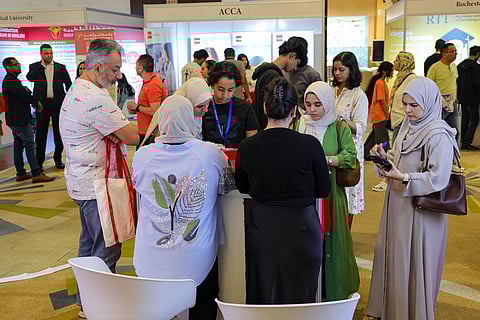 Families exploring courses at Gulf News Edufair's October edition in 2024
