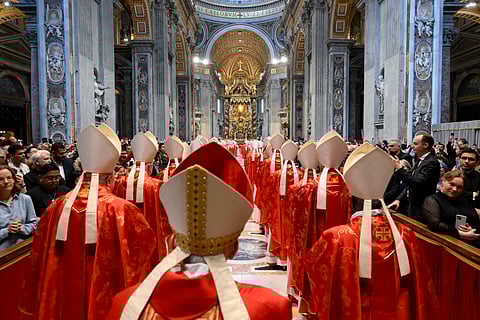 This photo taken and handout on May 7, 2025 by The Vatican Media shows cardinals during a holy mass for the Election of the Roman Pontiff, prior to the start of the conclave, at St Peter's Basilica in The Vatican.