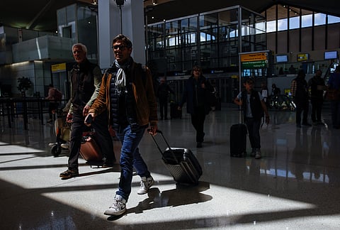 Passengers arrive to Terminal B at Newark Liberty International Airport in Newark, New Jersey on May 7, 2025.