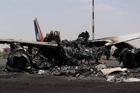 A destroyed plane sits on the tarmac at the Sanaa International Airport on May 7, 2025, a day after Israel's military warplanes struck Yemen's rebel-held capital Sanaa.