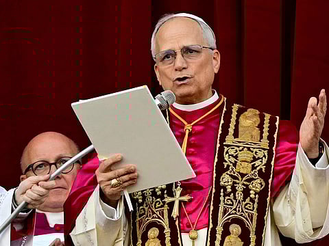 Newly elected Pope Leo XIV, Robert Prevost addresses the crowd from the main central loggia balcony of the St Peter's Basilica for the first time, after the cardinals ended the conclave, in The Vatican, on May 8, 2025.