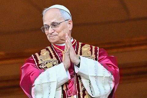 Newly elected Pope Leo XIV, Robert Francis Prevost arrives on the main central loggia balcony of the St Peter's Basilica for the first time, after the cardinals ended the conclave, in The Vatican, on May 8, 2025.