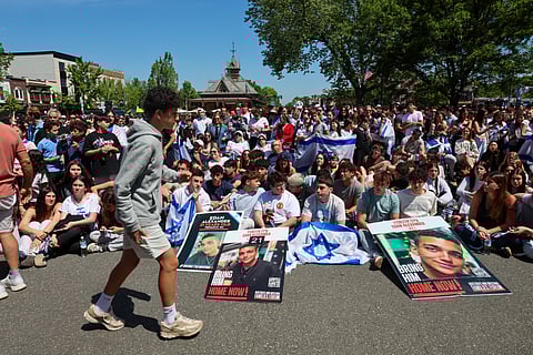 Hundreds of friends, family and residents gather to watch the release of Edan Alexander, the last living US citizen kidnapped by Hamas, on May 12, 2025, in his hometown of Tenafly, New Jersey.