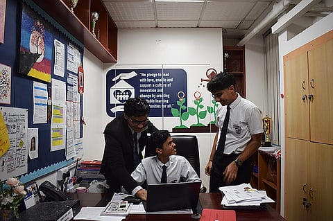 Hafeed Meera Shahul Hameed (centre) with his friends at GEMS Our Own Indian School, Dubai