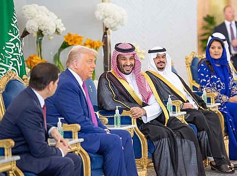 A handout picture provided by the Saudi Royal Palace shows Saudi Crown Prince Mohammed bin Salman meeting with US President Donald Trump in Riyadh on May 13, 2025.