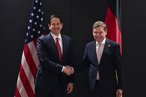 US Secretary of State Marco Rubio (L) shakes hands with Germany's Foreign Minister Johann Wadephul as they arrive for an informal meeting of The North Atlantic Treaty Organisation (NATO) foreign ministers ahead of potential peace talks between Ukraine and Russia in Turkey, in Antalya, on May 15, 2025.