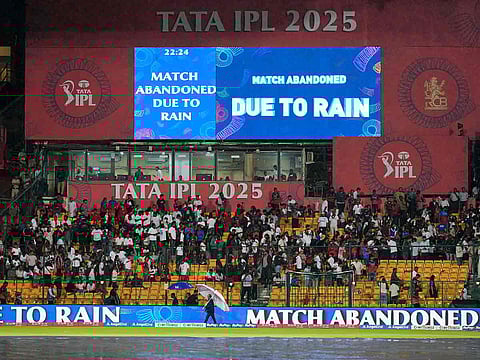 A digital display announces that the Indian Premier League cricket match between Kolkata Knight Riders and Royal Challengers Bengaluru is abandoned due to the rain, at Chinnaswamy Stadium in Bengaluru, India, Saturday, May 17, 2025.