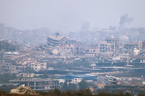 A picture taken from a position at the Israeli border with the Gaza Strip shows smoke billowing due to Israeli bombardment in the besieged Palestinian territory on May 18, 2025.