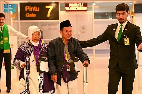 Hajji Legiman, a cleaning worker, is overjoyed that his lifetime dream has at last come true.