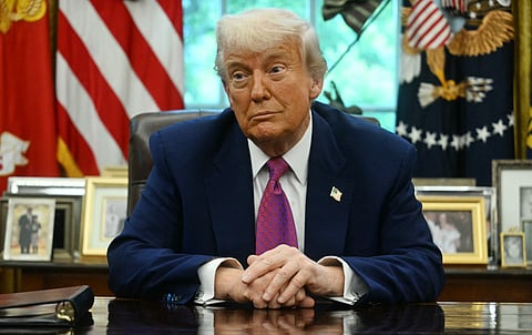 US President Donald Trump listens during an announcement about the Golden Dome missile defense shield, in the Oval Office of the White House on May 20, 2025, in Washington, DC.