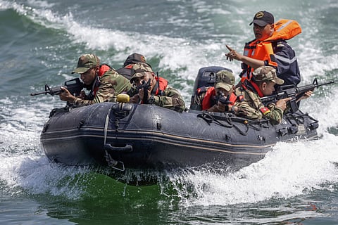 Members of Morocco's military simulate securing the port upon the arrival of a suspect vessel during the counter-weapons of mass destruction (C-WMD) exercise within the joint multinational African Lion 2025 (AL25) war games in Agadir on Morocco's Atlantic coast. File photo taken on May 20, 2025.