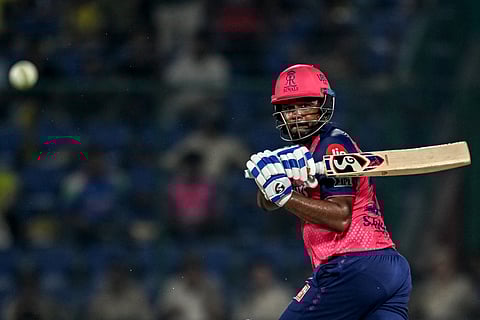 Rajasthan Royals' captain Sanju Samson watches the ball after playing a shot during the Indian Premier League (IPL) Twenty20 cricket match against Chennai Super Kings at the Arun Jaitley Stadium in New Delhi on May 20, 2025.