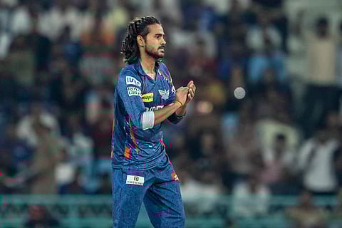 Lucknow Super Giants spinner Digvesh Rathi celebrating the wicket of Abhishek Sharma in his own signature style on Monday.