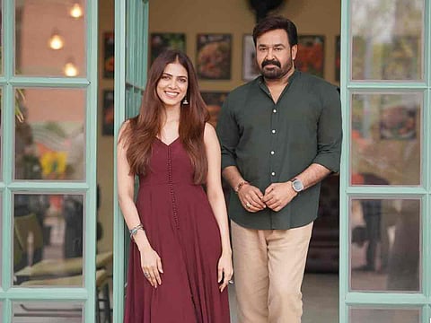 Malavika Mohanan with Mohanlal at the set of Sathyan Anthikad’s film ‘Hridayapoorvam’.