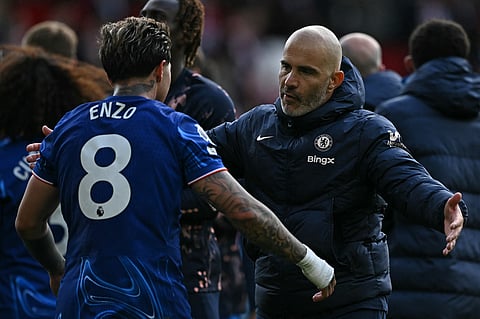 Chelsea's Italian head coach Enzo Maresca hugs Chelsea's Argentinian midfielder Enzo Fernandez after the English Premier League match against Nottingham Forest on Sunday.