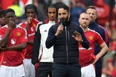 Manchester United's Ruben Amorim speaks to supporters after the final English Premier League match at Old Trafford on Sunday.