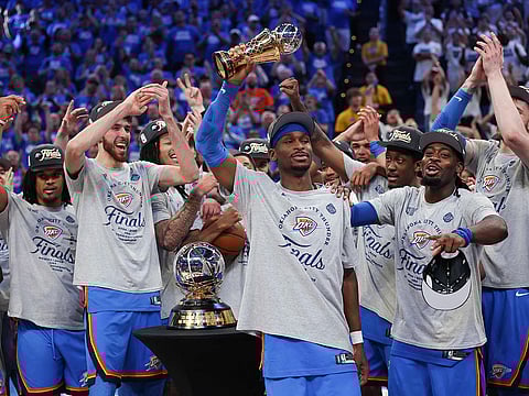 Shai Gilgeous-Alexander #2 of the Oklahoma City Thunder celebrates with teammates after winning the Western Conference Finals MVP after defeating the Minnesota Timberwolves 124-94 in Game Five of the Western Conference Finals of the 2025 NBA Playoffs at Paycom Center on May 28, 2025 in Oklahoma City, Oklahoma.