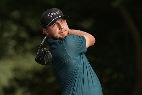 Alistair Docherty plays his tee shot on the 12th hole during the first round of the UNC Health Championship presented by STITCH 2025 at Raleigh Country Club on May 29 in Raleigh, North Carolina.