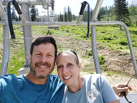 This June 4, 2023, photo shows Kell Morris, left, and his wife Jo Roop, in Sandpoint, Idaho.