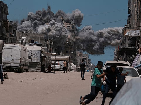 Smoke rises to the sky following an Israeli strike in Gaza City, Sunday, June 1, 2025.