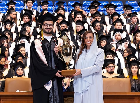 Sheikha Bodour bint Sultan Al Qasimi, President of AUS, honours students at the graduation ceremony.