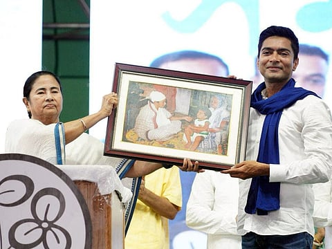 Mamata Banerjee and Abhishek Banerjee display a throwback picture of an injured Mamata with her mother and baby Abhishek.
