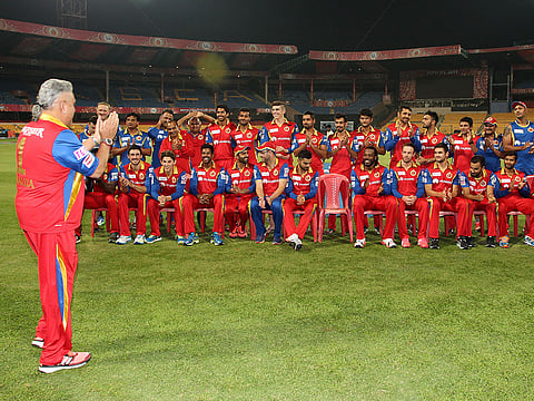 Former Royal Challenger Bengaluru owner Vijay Mallya meeting the team members ahead of a photo session.