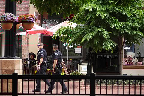 Officers at the Pearl Street Mall in front of the county courthose where an attack occurred on June 2, 2025, in Boulder.