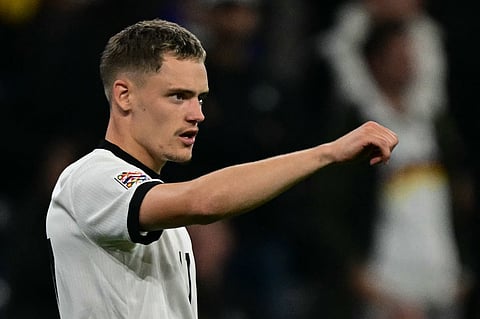 Germany's midfielder Florian Wirtz celebrates scoring the opening goal during the UEFA Nations League semi-final football match between Germany and Portugal in Munich, southern Germany on June 4, 2025.