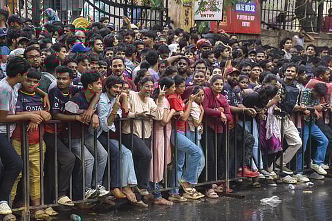 Fans gather outside the M. Chinnaswamy Stadium to celebrate Royal Challengers Bengaluru winning the Indian Premier League (IPL), in Bengaluru on June 4, 2025.