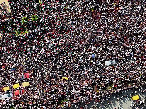 A massive crowd gathered for the Royal Challengers' victory celebrations near Vidhana Souda in Bengaluru on Wednesday.