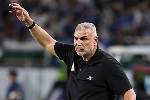 UAE's Romanian coach Cosmin Olaroiu gestures during the 2026 FIFA World Cup Asian Qualifier match against Uzbekistan at Al Nahyan Stadium in Abu Dhabi on Thursday.